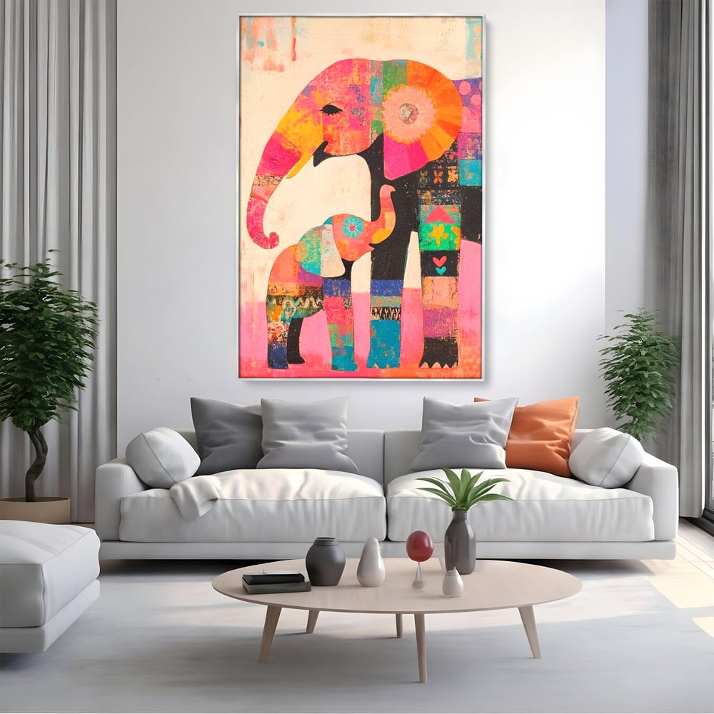 Tablou canvas cu tablou pictura cu elefanti colorati, in rama de aluminiu argintiu, pe perete intr-un living